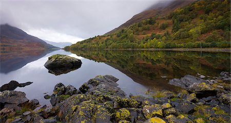 The still waters of Loch Leven on a grey autumn day, Lochleven, Highlands, Scotland, United Kingdom, Europe Fotografie stock - Rights-Managed, Codice: 841-06343425