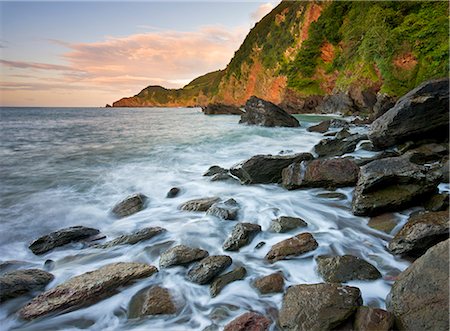 simsearch:841-06343482,k - Waves crash around the rocky shores of Woody Bay at high tide, Exmoor National Park, Devon, England, United Kingdom, Europe Fotografie stock - Rights-Managed, Codice: 841-06343506