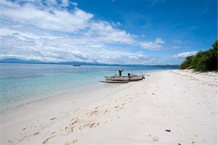 sulawesi - Plage avec bateau de pêche, Manado, Sulawesi, Indonésie, Asie du sud-est, Asie Photographie de stock - Rights-Managed, Code: 841-06444673