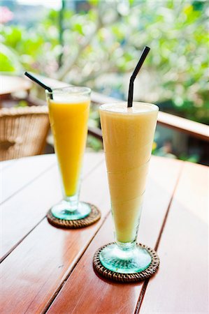 Jus de fruit de mangue au petit déjeuner dans un café à Ubud, Bali (Indonésie), l'Asie du sud-est, Asie Photographie de stock - Rights-Managed, Code: 841-06445051