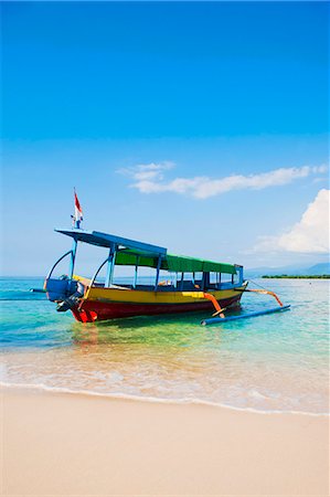 Traditional colourful Indonesian boat on the tropical island of Gili Meno, Gili Islands, Indonesia, Southeast Asia, Asia Stock Photo - Rights-Managed, Code: 841-06445072