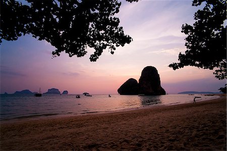 railay - Colourful purple tropical sunset at Ao Phra Nang Beach, Railay (Rai Leh), South Thailand, Southeast Asia, Asia Stock Photo - Rights-Managed, Code: 841-06445212