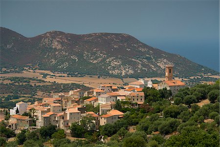 An elevated view of the picturesque village of Aregno in the inland Haute Balagne region, Corsica, France, Mediterranean, Europe Stock Photo - Rights-Managed, Code: 841-06445548