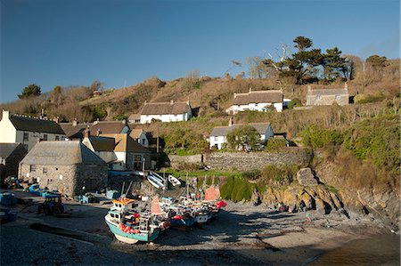 Colourful wooden fishing boats in Cadgwith Harbour on the Lizard Peninsula in Cornwall, England, United Kingdom, Europe Stock Photo - Rights-Managed, Code: 841-06445589