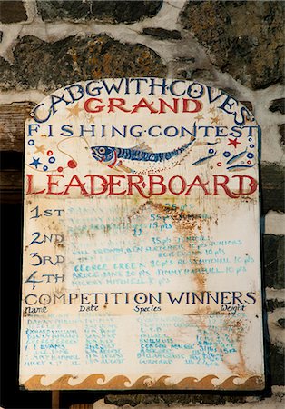 An old painted wooden sign in Cadgwith Harbour on the Lizard Peninsula in Cornwall, England, United Kingdom, Europe Stock Photo - Rights-Managed, Code: 841-06445590