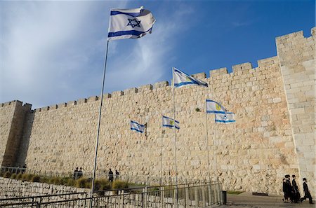 View of City Walls with Orthodox Jews and Israeli flag. Old City, Jerusalem, Israel, Middle East Stock Photo - Rights-Managed, Code: 841-06445883