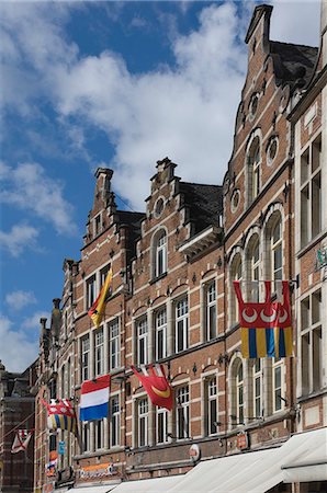 Traditional gabled facades decorated with heraldic banners, Oude Markt, Leuven, Belgium, Europe Stock Photo - Rights-Managed, Code: 841-06446277