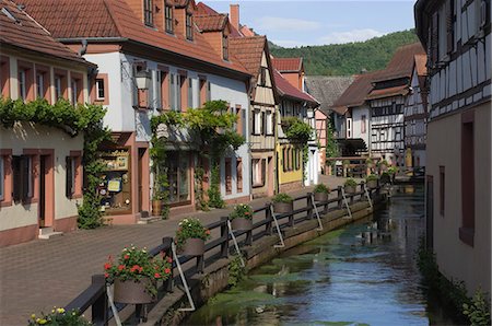 Traditional houses by mill stream along Wassergasse, Annweiler am Trifels, Pfalz wine area, Rhineland Palatinate, Germany, Europe Stock Photo - Rights-Managed, Code: 841-06446283