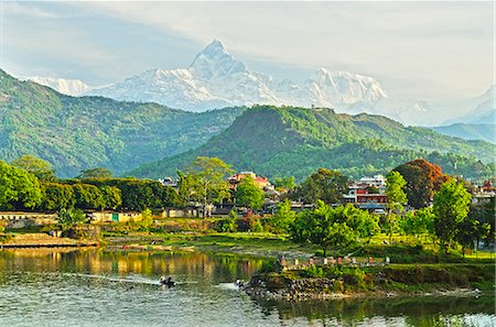 Annapurna Himal, Machapuchare and Phewa Tal seen from Pokhara, Gandaki Zone, Western Region, Nepal, Himalayas, Asia Stock Photo - Rights-Managed, Code: 841-06446555