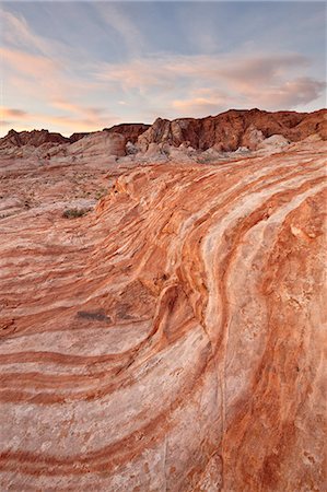 Orange and white sandstone layers with colorful clouds at sunrise, Valley Of Fire State Park, Nevada, United States of America, North America Stock Photo - Rights-Managed, Code: 841-06446815