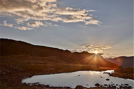 Sunset over an Alpine tarn at Stoney Pass, San Juan National Forest, Colorado, United States of America, North America Foto de stock - Con derechos protegidos, Código: 841-06446913