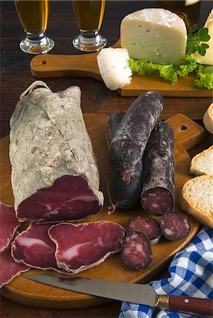 Motsetta (Motzetta) (Mocetta), chamois or beef meat salted, seasoned and dried, Boudin sausages and goat cheese, Italy, Europe Stock Photo - Rights-Managed, Code: 841-06446943