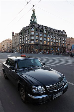 europe taxi car - Taxi parked on Nevsky Prospekt with the House of Books in the distance, St. Petersburg, Russia, Europe Stock Photo - Rights-Managed, Code: 841-06447188