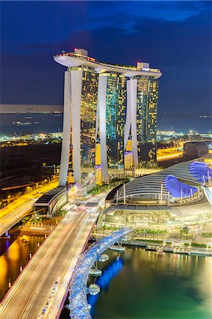 The Helix Bridge and Marina Bay Sands Singapore at night, Marina Bay, Singapore, Southeast Asia, Asia Stock Photo - Rights-Managed, Code: 841-06447228
