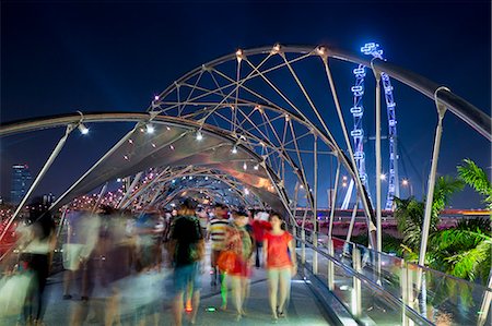 rio singapore - The Helix bridge at Marina Bay and Singapore Flyer, Singapore, Southeast Asia, Asia Foto de stock - Direito Controlado, Número: 841-06447243