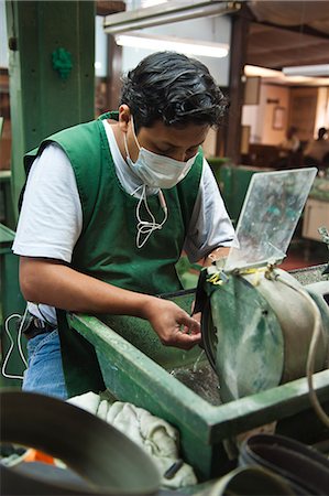 simsearch:841-06445627,k - Workers polishing jade at the Casa del Jade (Jade House) Factory and Museum, Antigua, Guatemala, Central America Stock Photo - Rights-Managed, Code: 841-06447312