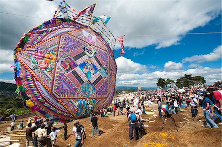 person with scales - Day Of The Dead kites (barriletes) in cemetery in Santiago Sacatepequez, Guatemala, Central America Stock Photo - Rights-Managed, Code: 841-06447425