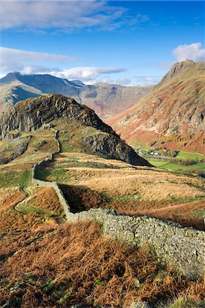 dry stone wall - Drystone wall winding across mountain ridge overlooking Great Langdale, Lake District, Cumbria, England, United Kingdom, Europe Stock Photo - Rights-Managed, Code: 841-06447451