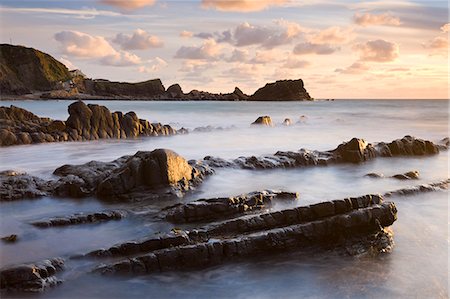 simsearch:841-06447511,k - Late evening sunshine glistens on the wet rocks at Hartland Quay, North Devon, England, United Kingdom, Europe Stock Photo - Rights-Managed, Code: 841-06447474