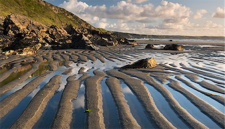 simsearch:841-08542526,k - Patterns in the sand at low tide on Tregardock Beach, Cornwall, England, United Kingdom, Europe Foto de stock - Con derechos protegidos, Código: 841-06447601