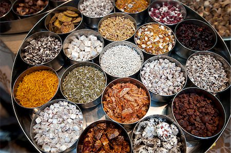 simsearch:841-06447758,k - Various types of sonf, mouth freshener, in aluminium pots, some coated in silver, in sonf stall in market, Kolkata, West Bengal, India, Asia Stock Photo - Rights-Managed, Code: 841-06447764