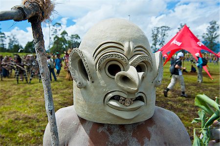 ethnic mask and costumes - Mudman tribesman celebrating the traditional Sing Sing in the Highlands, Papua New Guinea, Pacific Stock Photo - Rights-Managed, Code: 841-06448216