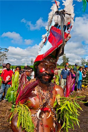 papua new guinea - Colourfully dressed and face painted local tribesman celebrating the traditional Sing Sing in the Highlands, Papua New Guinea, Pacific Stock Photo - Rights-Managed, Code: 841-06448212