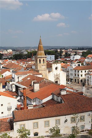 Roofs and the octagonal spire of the Church of St. John the Baptist (Sao Joao Baptista) in the city of Tomar, Ribatejo, Portugal, Europe Stock Photo - Rights-Managed, Code: 841-06448428