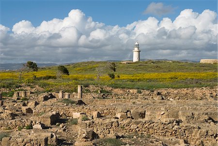View over ruined Roman town to the lighthouse, The Agora, Archaeological Park, Paphos, UNESCO World Heritage Site, Cyprus, Europe Fotografie stock - Rights-Managed, Codice: 841-06449305