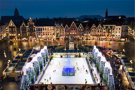 Ice Rink and Christmas Market in the Market Square, Bruges, West Vlaanderen (Flanders), Belgium, Europe Stock Photo - Rights-Managed, Code: 841-06449485