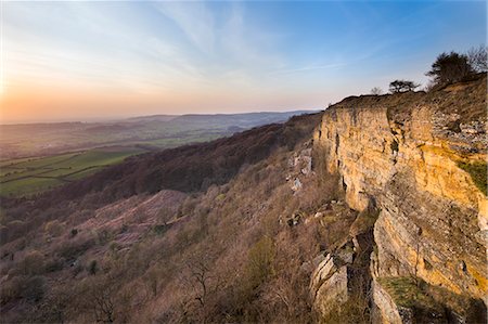 simsearch:841-08244264,k - The setting sun illuminates Whitestone Cliff at Sutton Bank, North Yorkshire, Yorkshire, England, United Kingdom, Europe Foto de stock - Con derechos protegidos, Código: 841-06449590