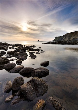 english coast - Incoming tide and clouds at Saltwick Bay, North Yorkshire, Yorkshire, England, United Kingdom, Europe Stock Photo - Rights-Managed, Code: 841-06449623