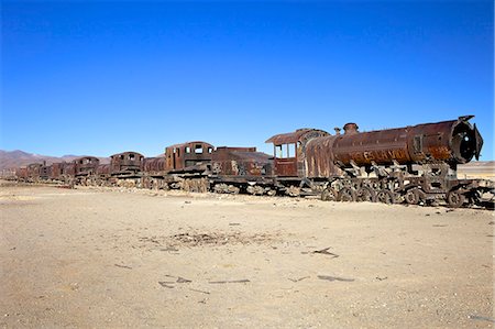 Rusting old steam locomotives at the Train cemetery (train graveyard), Uyuni, Southwest, Bolivia, South America Stock Photo - Rights-Managed, Code: 841-06449766