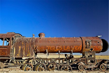 south america travel color - Rusting old steam locomotive at the Train cemetery (train graveyard), Uyuni, Southwest, Bolivia, South America Stock Photo - Rights-Managed, Code: 841-06449769