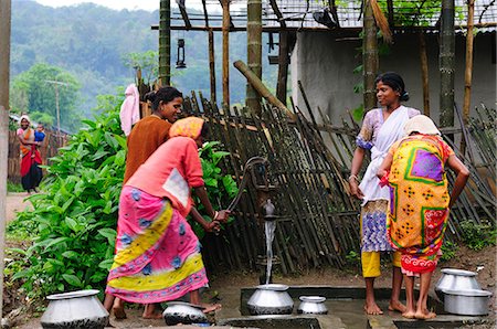 portrait outside work water - Women pumping water from a hand pump, Jorhat, Assam, India, Asia Stock Photo - Rights-Managed, Code: 841-06499735