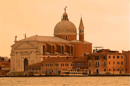 Il Redentore church dating from 1576, on Giudecca island, and Giudecca Canal with vaporetto, at sunset, Venice, UNESCO World Heritage Site, Veneto, Italy, Europe Stock Photo - Rights-Managed, Code: 841-06499975