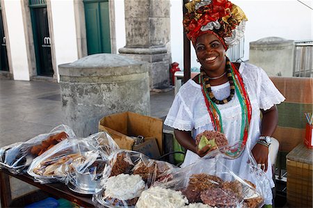 Bahian woman in traditional white dress (Baiana) selling street food at the Pelourinho district, Salvador (Salvador de Bahia), Bahia, Brazil, South America Stock Photo - Rights-Managed, Code: 841-06500402