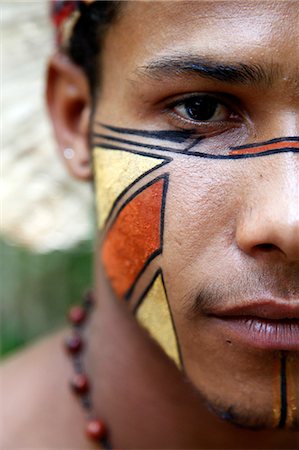 painted face - Portrait of a Pataxo Indian man at the Reserva Indigena da Jaqueira near Porto Seguro, Bahia, Brazil, South America Stock Photo - Rights-Managed, Code: 841-06500523