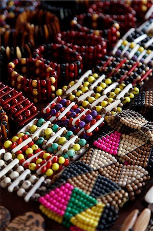 Crafts for sale at the souvenir shop of the Pataxo Indian people at the Reserva Indigena da Jaqueira near Porto Seguro, Bahia, Brazil, South America Foto de stock - Con derechos protegidos, Código: 841-06500533