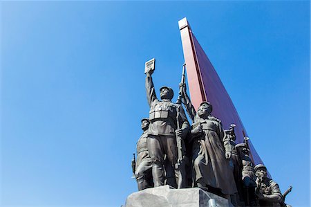 political - Mansudae Grand Monument depicting the Anti Japanese Revolutionary Struggle and Socialist Revolution and Construction, Mansudae Assembly Hall on Mansu Hill, Pyongyang, Democratic People's Republic of Korea (DPRK), North Korea, Asia Stock Photo - Rights-Managed, Code: 841-06501199