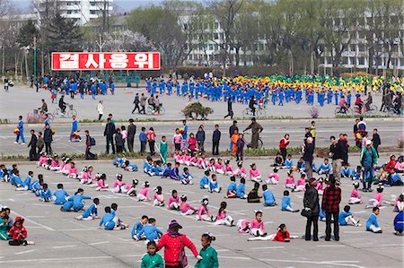 Children practising mass games outside the Grand Theatre, Hamhung, Democratic People's Republic of Korea (DPRK), North Korea, Asia Stock Photo - Rights-Managed, Code: 841-06501251