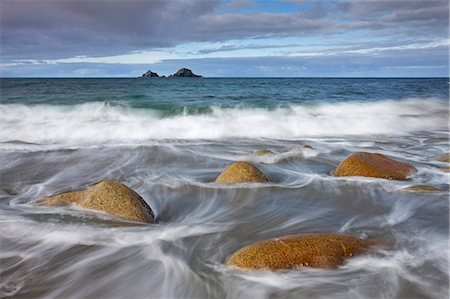 Waves swirl around rocks on Porth Nanven beach, Cornwall, England, United Kingdom, Europe Stock Photo - Rights-Managed, Code: 841-06501326