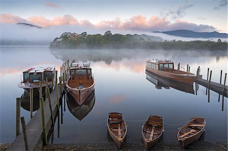 Boats on Derwent Water on a misty autumn morning, Lake District National Park, Keswick, Cumbria, England, United Kingdom, Europe Stock Photo - Rights-Managed, Code: 841-06501345