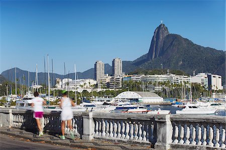 People jogging with Christ the Redeemer statue in background, Urca, Rio de Janeiro, Brazil, South America Stock Photo - Rights-Managed, Code: 841-06501522