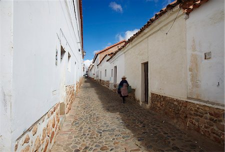rustic streets - Woman walking along alleyway, Sucre, UNESCO World Heritage Site, Bolivia, South America Stock Photo - Rights-Managed, Code: 841-06501623