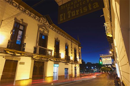 sucré - Traffic passing along street at dusk, Sucre, UNESCO World Heritage Site, Bolivia, South America Stock Photo - Rights-Managed, Code: 841-06501656
