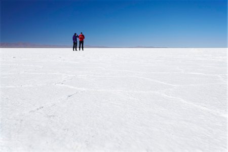 salzflächen - Couple taking photos on Salar de Uyuni (Salt Flats of Uyuni), Potosi Department, Bolivia, South America Stockbilder - Lizenzpflichtiges, Bildnummer: 841-06501687