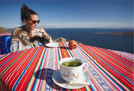Cocoa leaf tea at outdoor cafe on Isla del Sol (Island of the Sun), Lake Titicaca, Bolivia, South America Photographie de stock - Rights-Managed, Code: 841-06501790