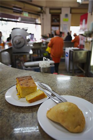 paraguay - Sopa paraguaya (cornbread with cheese and onion) and empanada in Lido Bar, Asuncion, Paraguay, South America Fotografie stock - Rights-Managed, Codice: 841-06501877