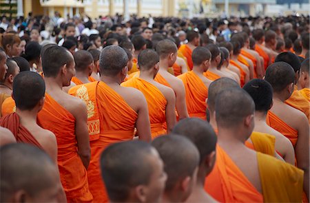 Monks in mourning parade for the late King Sihanouk outside Royal Palace, Phnom Penh, Cambodia, Indochina, Southeast Asia, Asia Stock Photo - Rights-Managed, Code: 841-06501916
